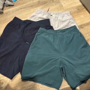 Men’s lulu shorts size small gray blue and green color